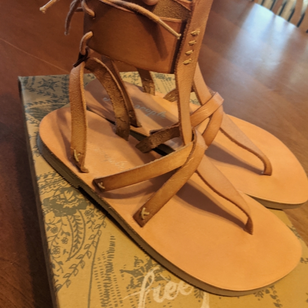 FP New with box, never worn leather  Caramel color